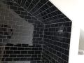 black shower angled ceiling